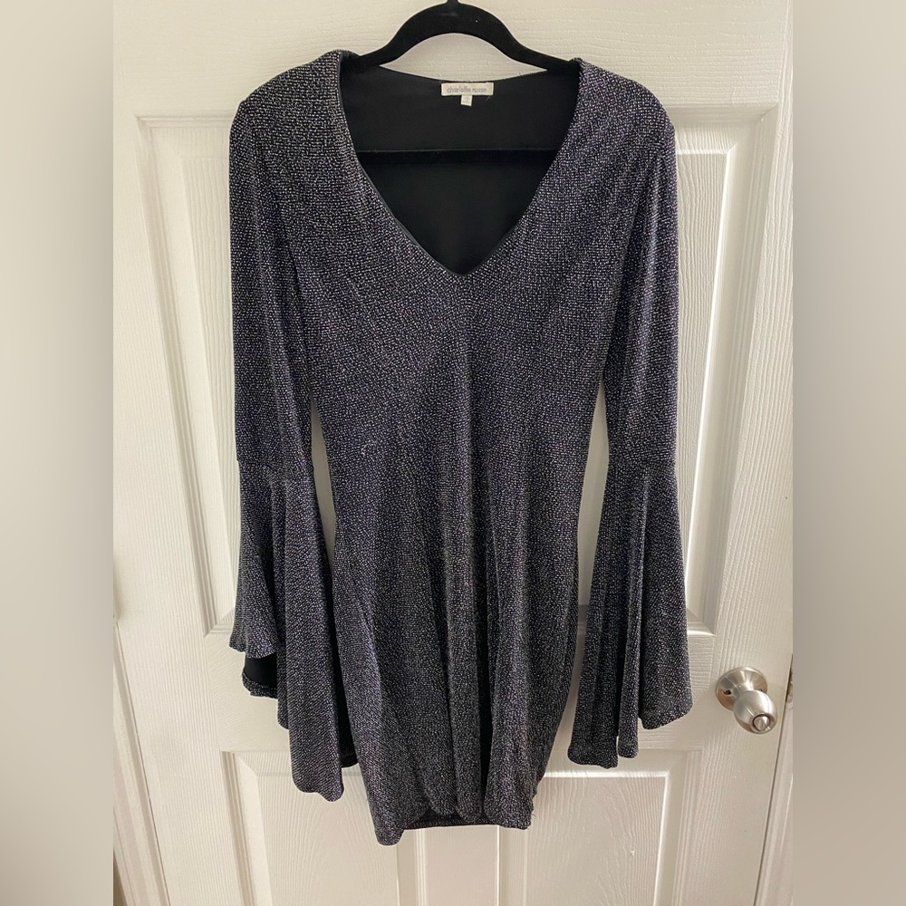 Silver and black shiny short dress with bell sleeves.
